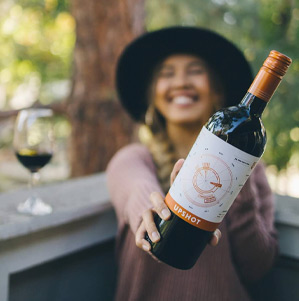 upshot-red-lifestyle-girl-holding-bottle