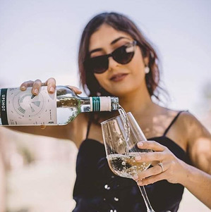 upshot-white-woman-pouring-wine